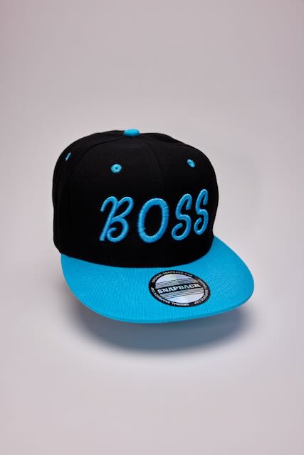 Black and blue 3D puffy embroidery hat with BOSS text and snapback closure by Threadify Shop