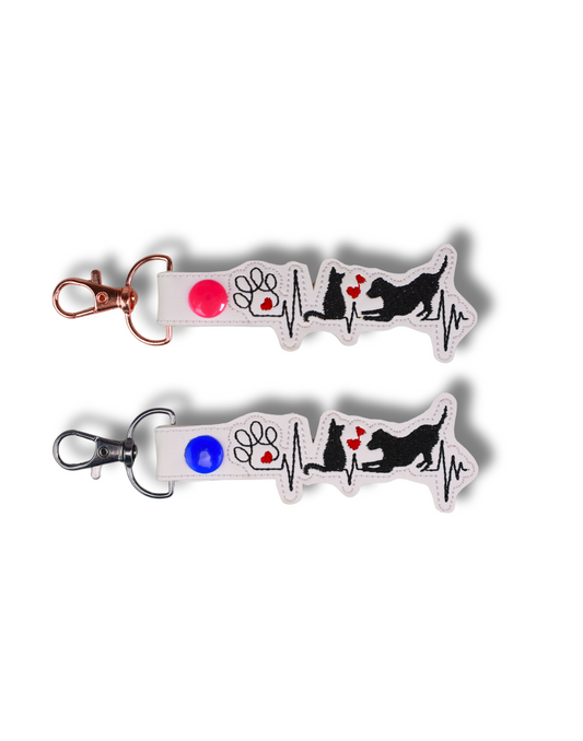 Cat dog heartbeat embroidered keychain from Threadify Shop with black silhouettes and colorful snap buttons